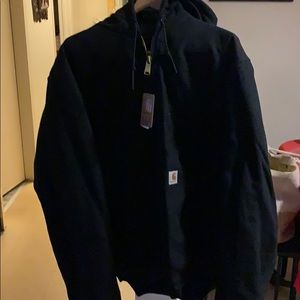 Men’s L Tall New Carhartt coat.$100.00
